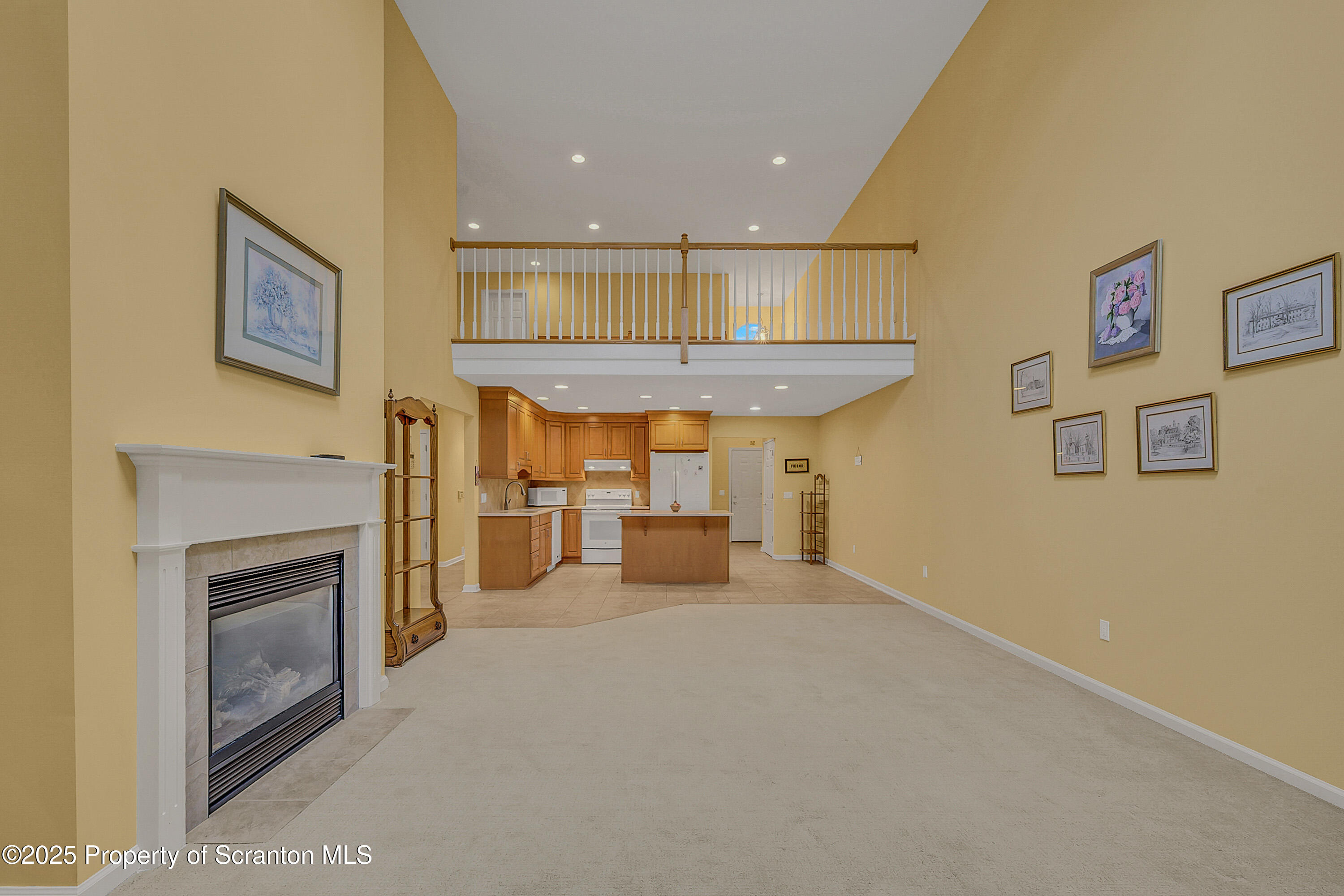83 Hedge Row Run Clarks Summit, PA 18411 - Photo 16 of 49 a view of a livingroom with a fireplace