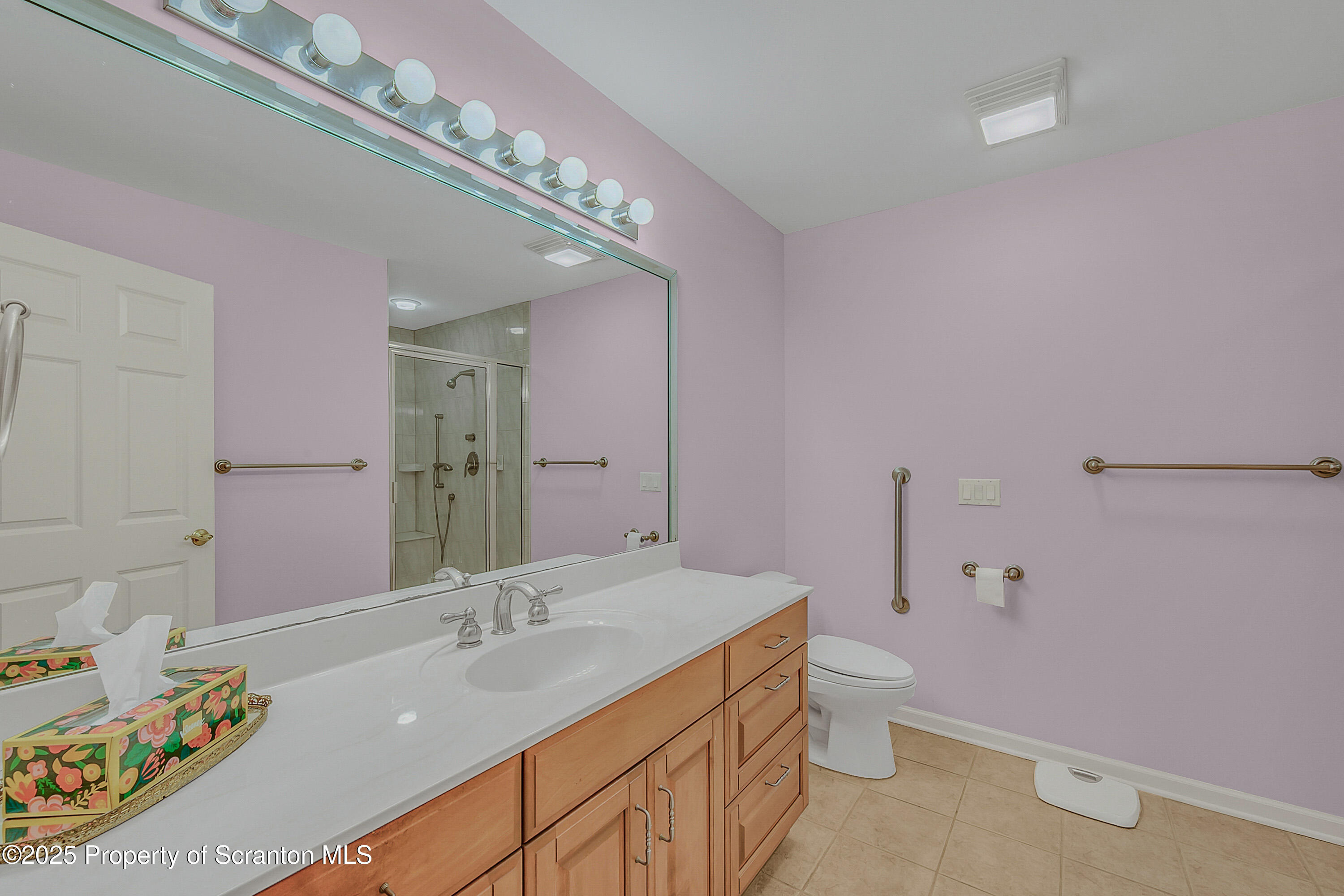 83 Hedge Row Run Clarks Summit, PA 18411 - Photo 20 of 49 a bathroom with a sink a toilet and a mirror