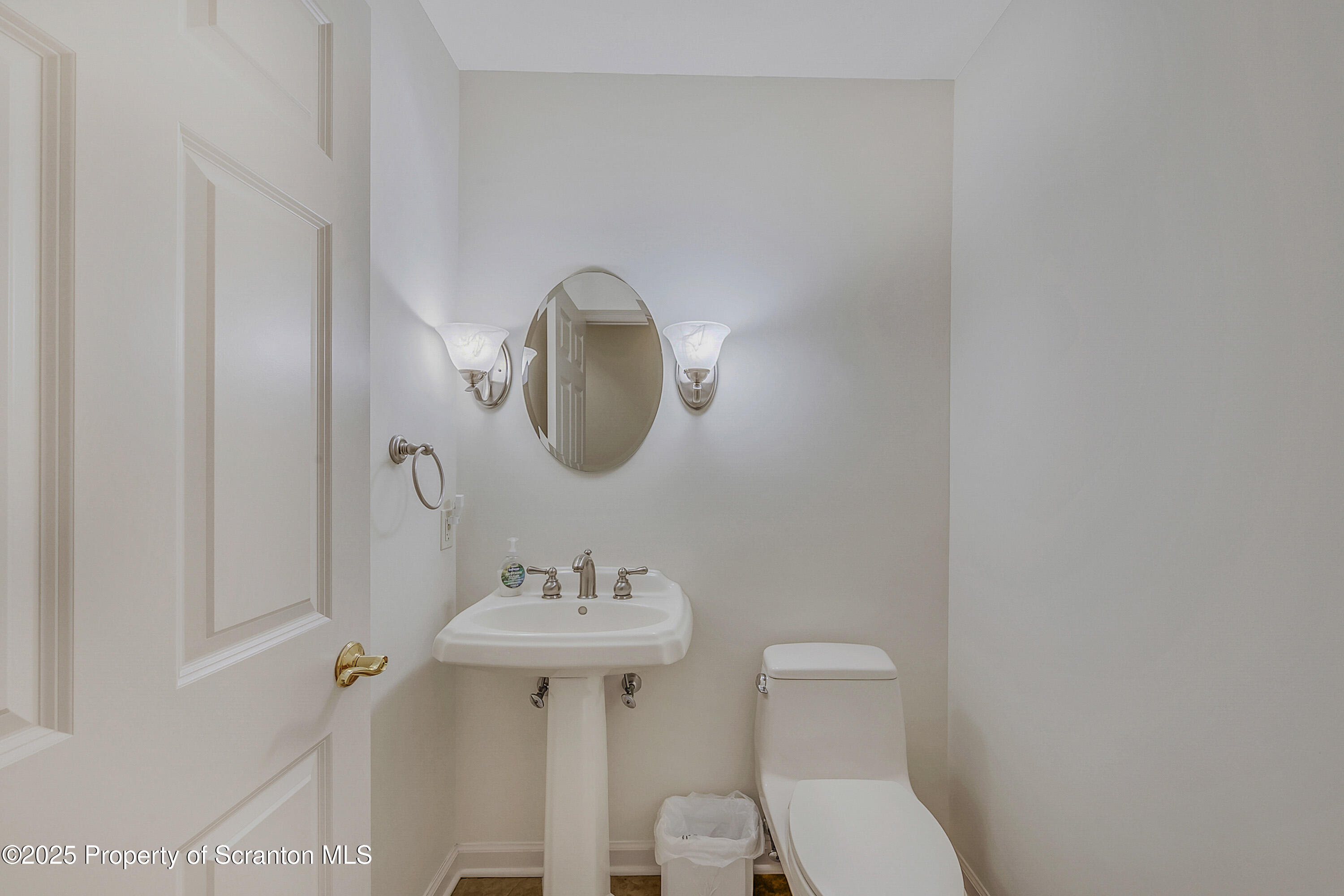 83 Hedge Row Run Clarks Summit, PA 18411 - Photo 24 of 49 a bathroom with a toilet sink and mirror