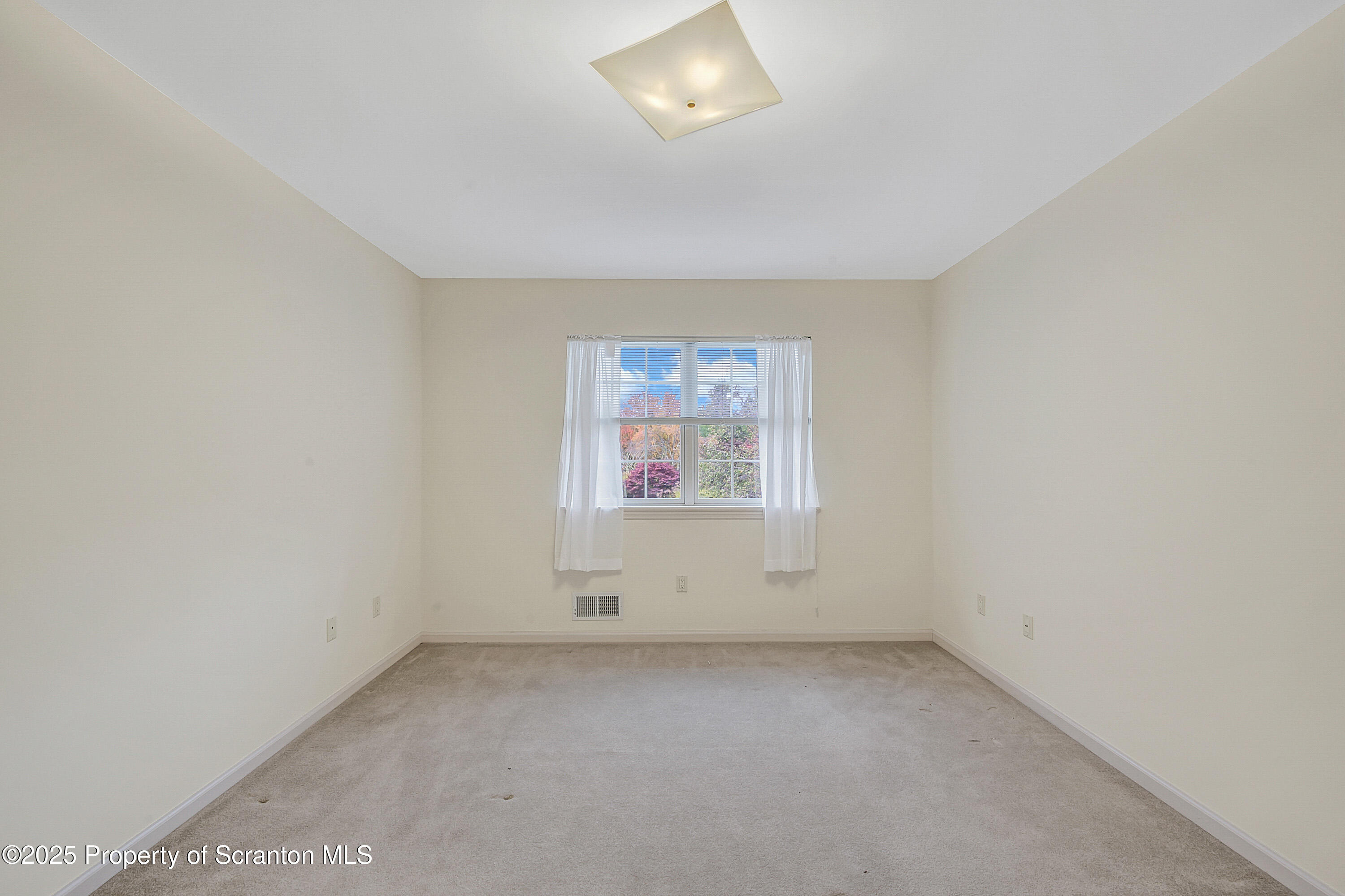 83 Hedge Row Run Clarks Summit, PA 18411 - Photo 30 of 49 an empty room with a window