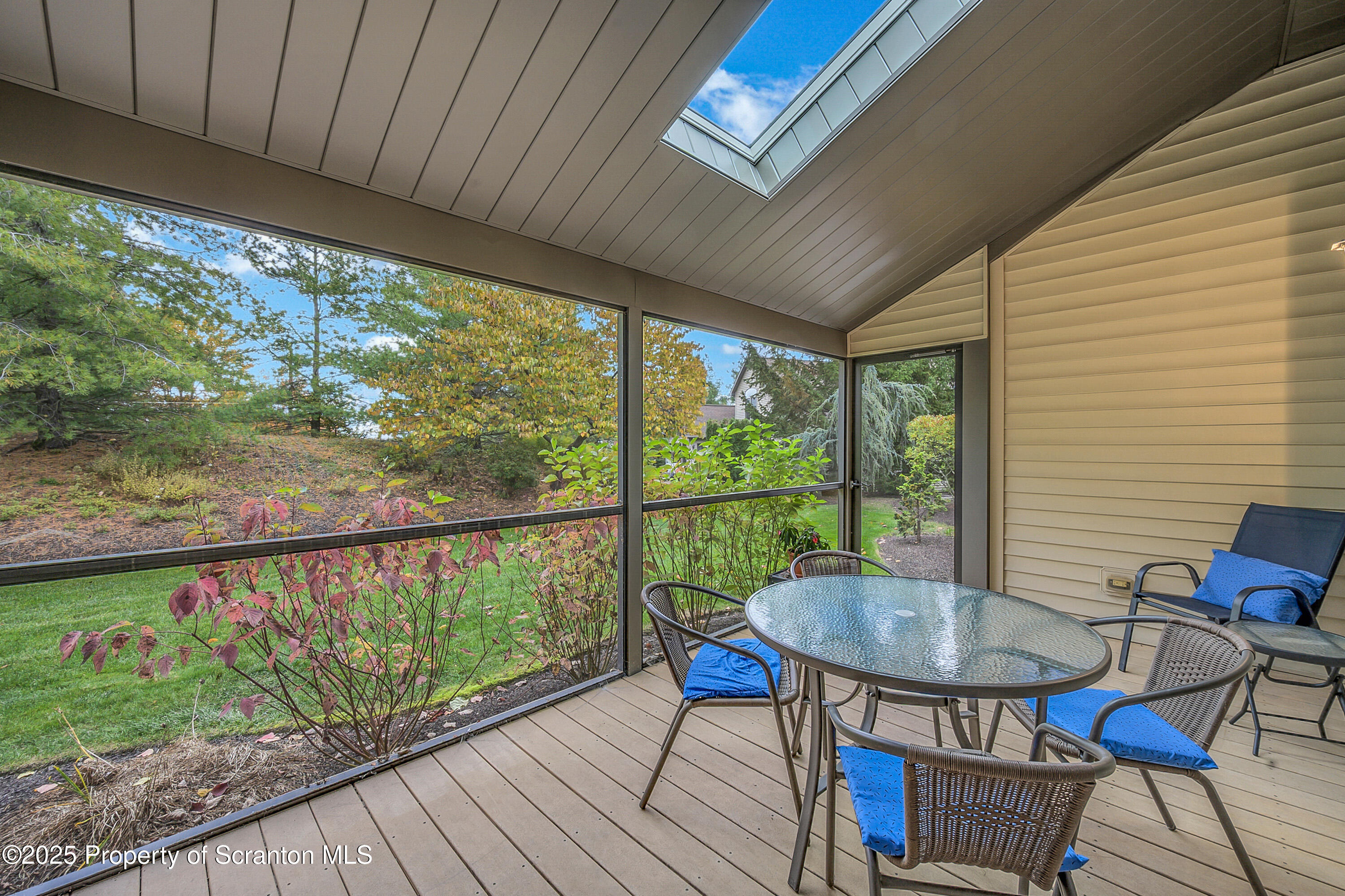 83 Hedge Row Run Clarks Summit, PA 18411 - Photo 39 of 49 a view of a balcony with furniture and wooden floor