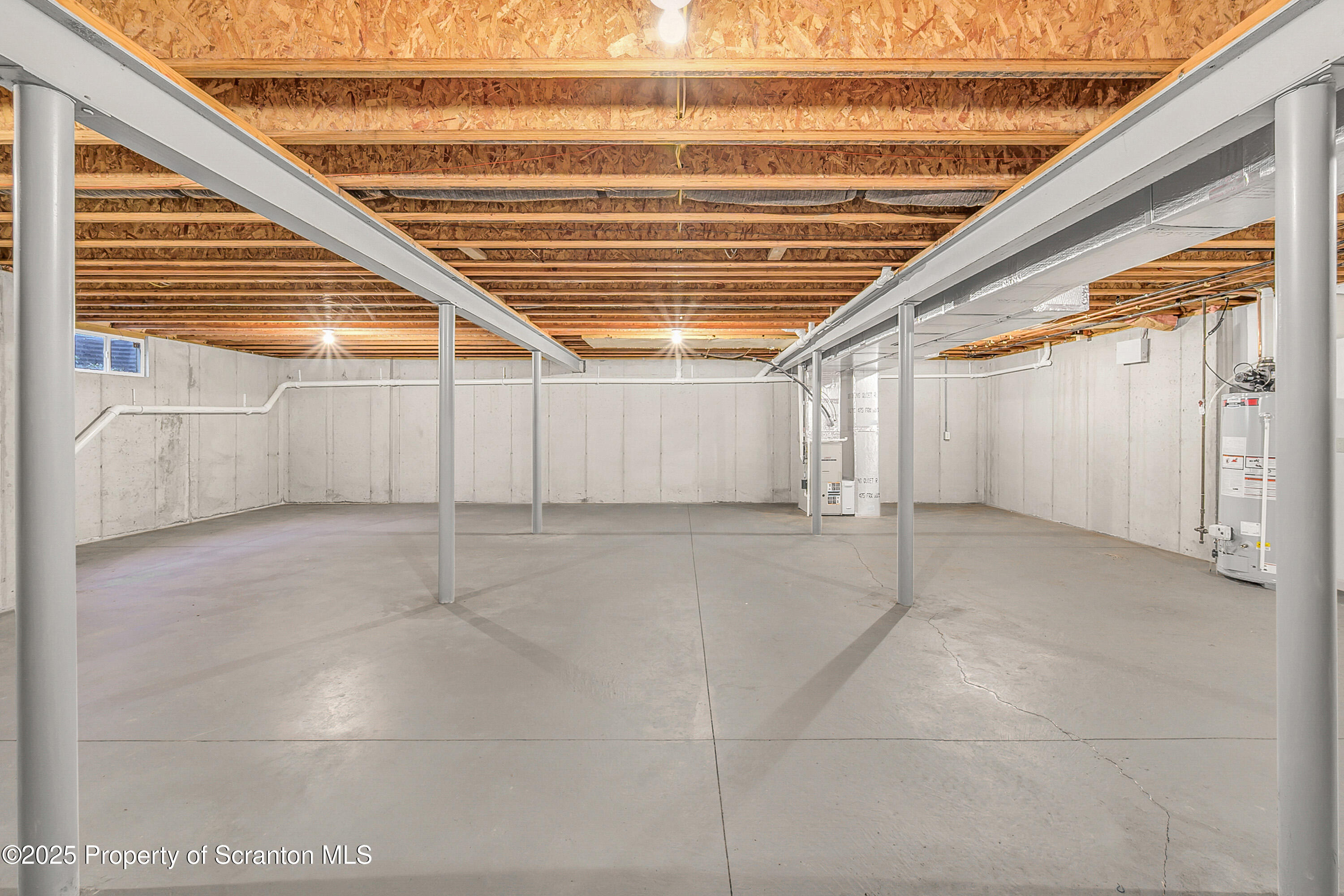 83 Hedge Row Run Clarks Summit, PA 18411 - Photo 41 of 49 a view of an empty room with wooden walls