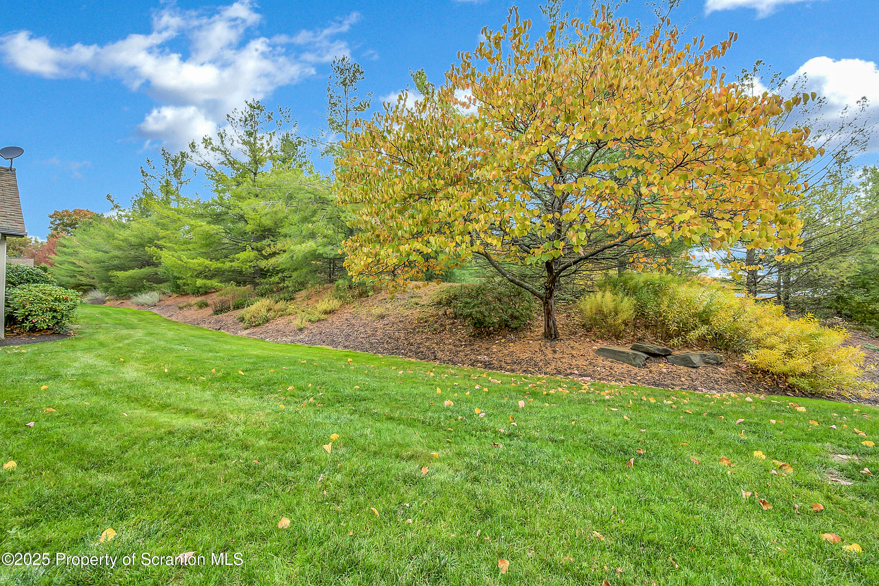 83 Hedge Row Run Clarks Summit, PA 18411 - Photo 5 of 49 a backyard of a house with lots of green space