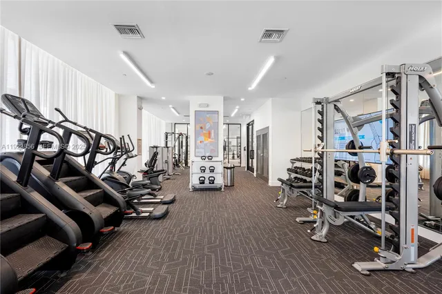 a view of a room with gym equipment