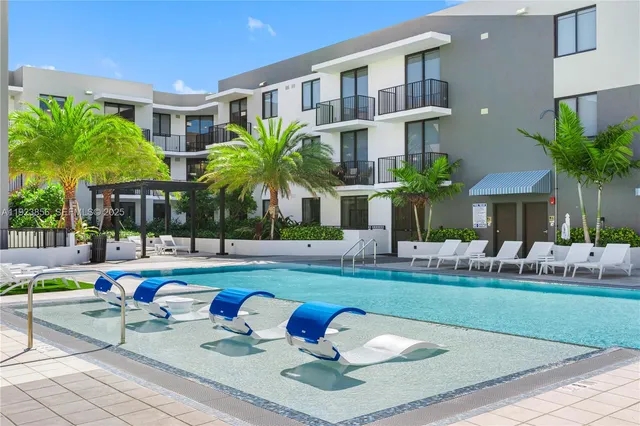 a front view of house with yard and outdoor seating