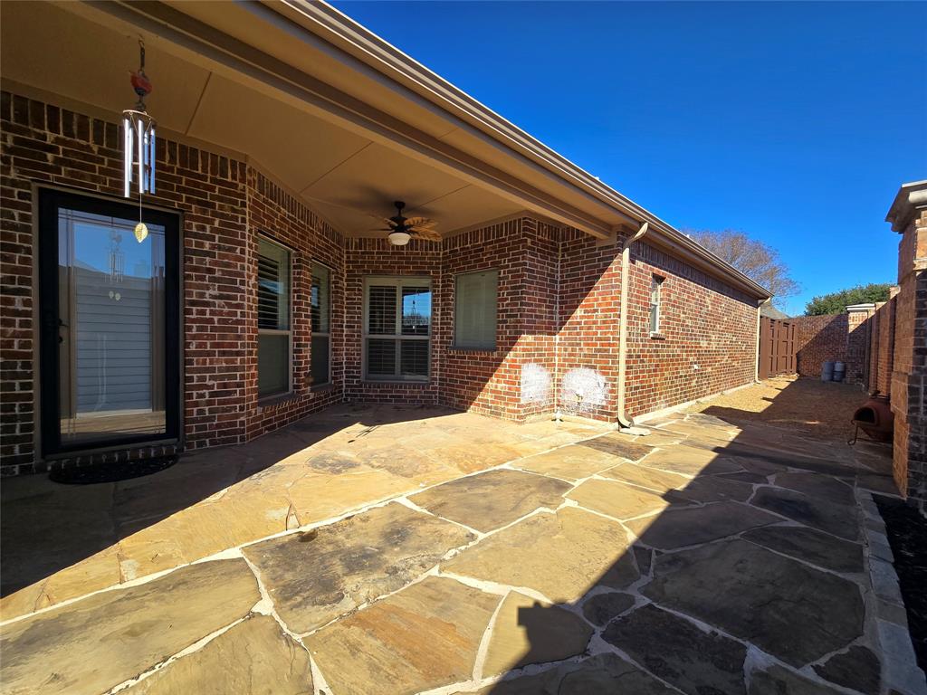 1800 Lancaster Gate Allen, TX 75013 - Photo 18 of 20 a view of a house with a backyard