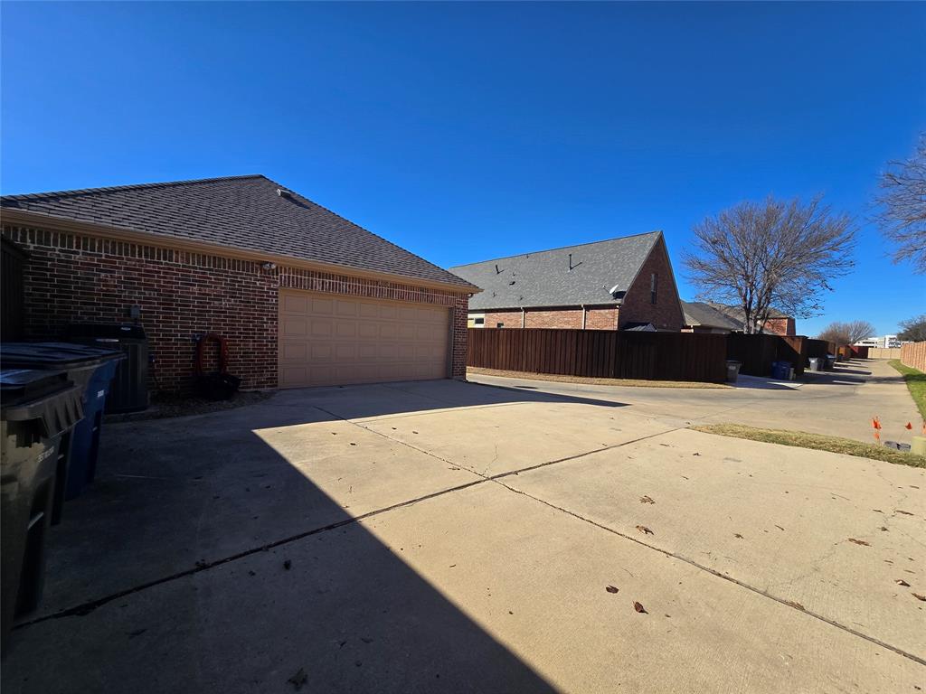 1800 Lancaster Gate Allen, TX 75013 - Photo 19 of 20 a view of a parking space in front of a building