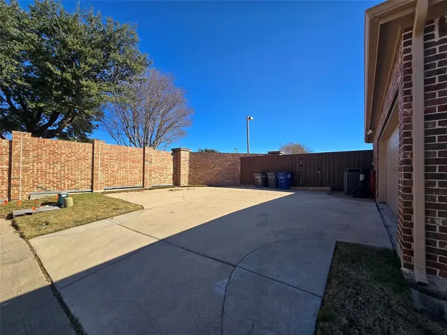 a view of backyard with outdoor space