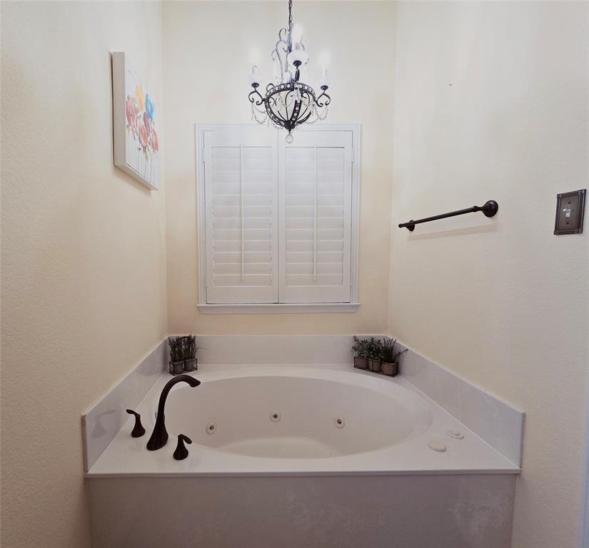 1800 Lancaster Gate Allen, TX 75013 - Photo 10 of 20 a bathroom with a bathtub