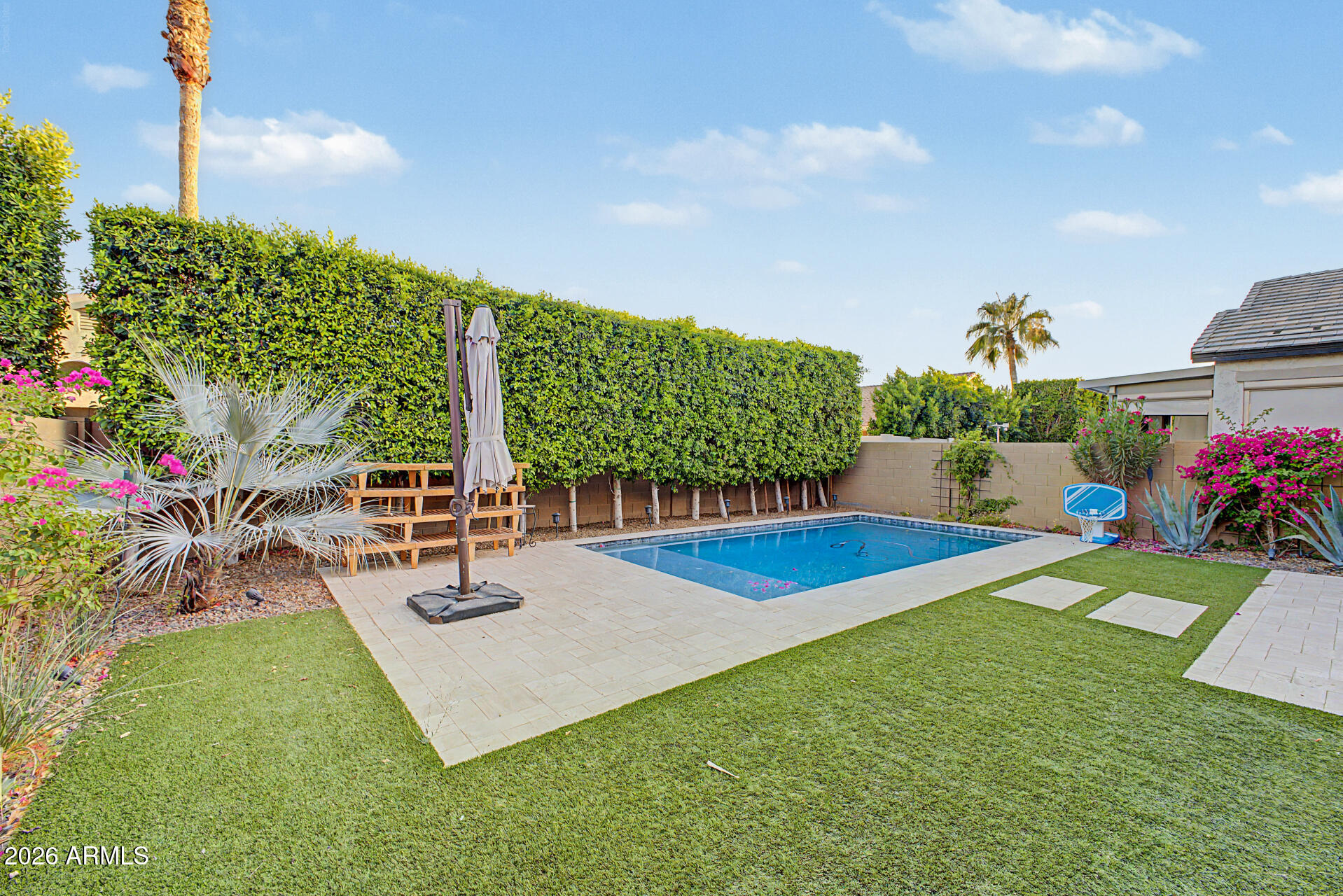 819 West Deer Creek Road Phoenix, AZ 85048 - Photo 72 of 76 a view of a backyard with plants and patio