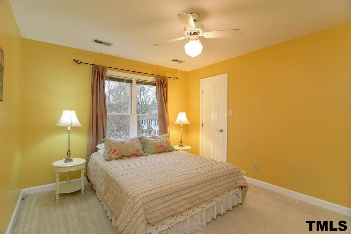 8101 Winstone Court Raleigh, NC 27615 - Photo 17 of 25 Generously sized secondary bedrooms.