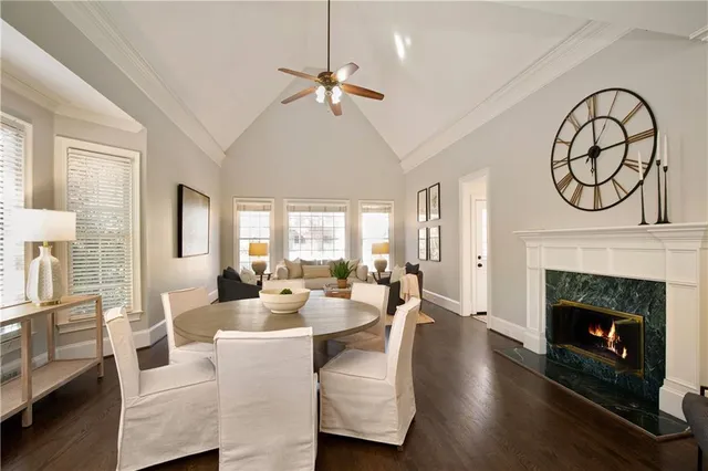 a bedroom with a large bed and a couch