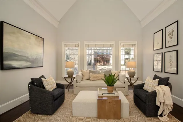 a bathroom with a granite countertop tub sink and mirror