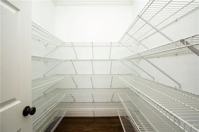 a bathroom with a toilet sink and shower