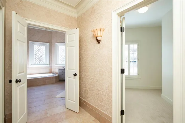 a view of a patio with couches table and chairs and potted plants