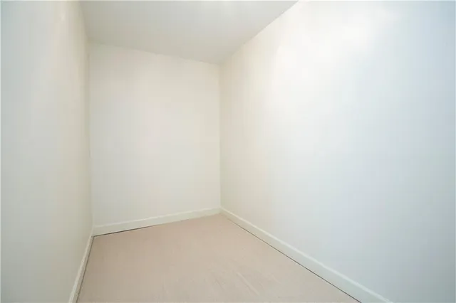 a balcony with wooden floor and breakfast area