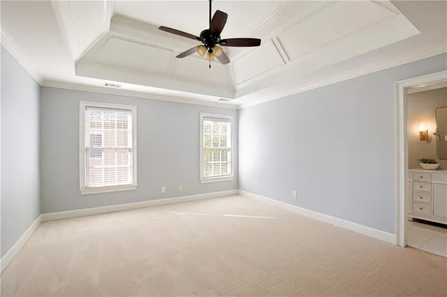 a view of a swimming pool in a backyard