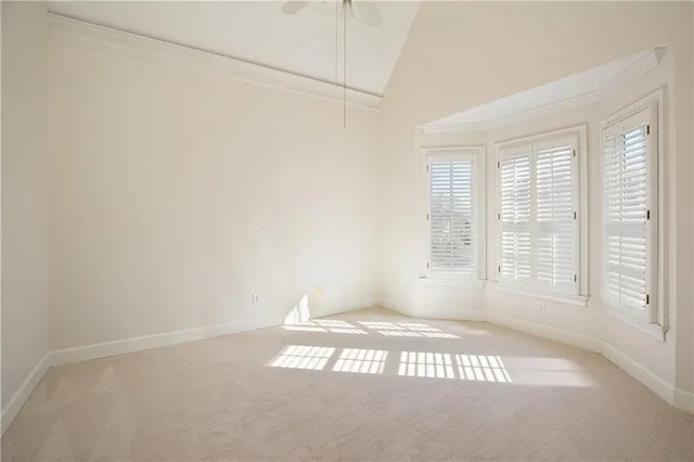 a view of backyard with outdoor seating and green space