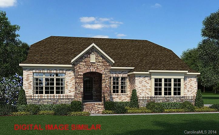 963 Castlewatch Drive, Unit 107 Fort Mill, SC 29708 - Photo 1 of 1 front view of a house with a yard