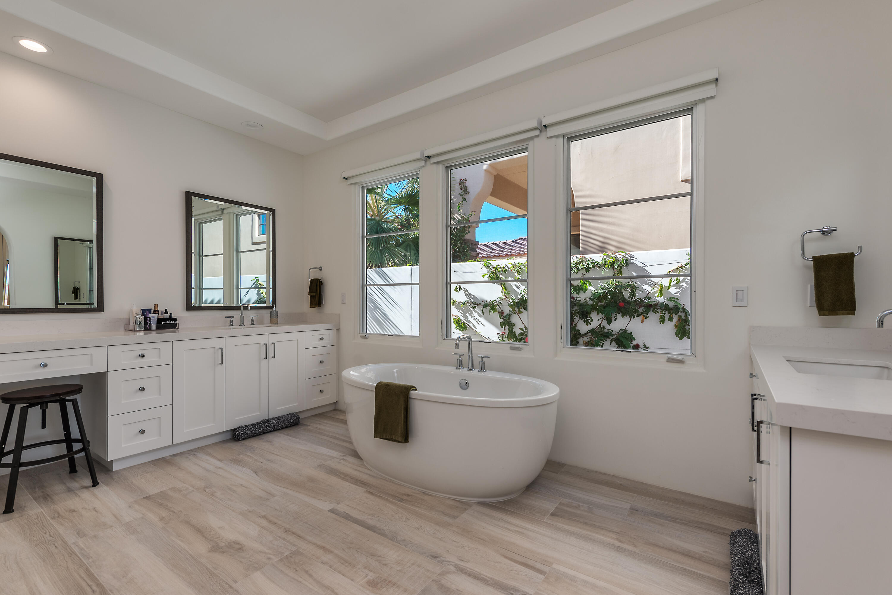81660 Andalusia La Quinta, CA 92253 - Photo 22 of 36 a large room with a window wooden floor and a sink