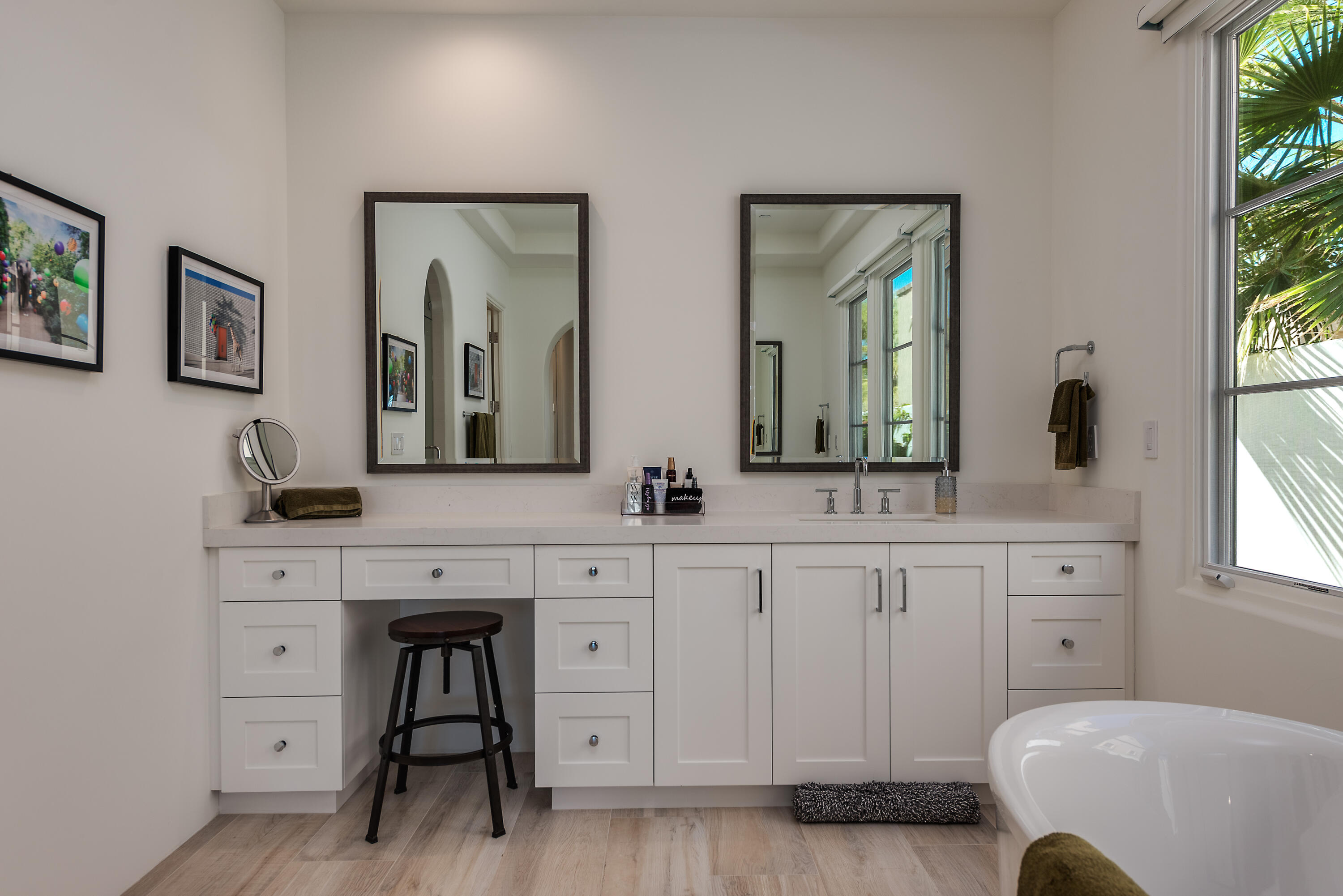 81660 Andalusia La Quinta, CA 92253 - Photo 24 of 36 a spacious bathroom with double vanity sink and a window