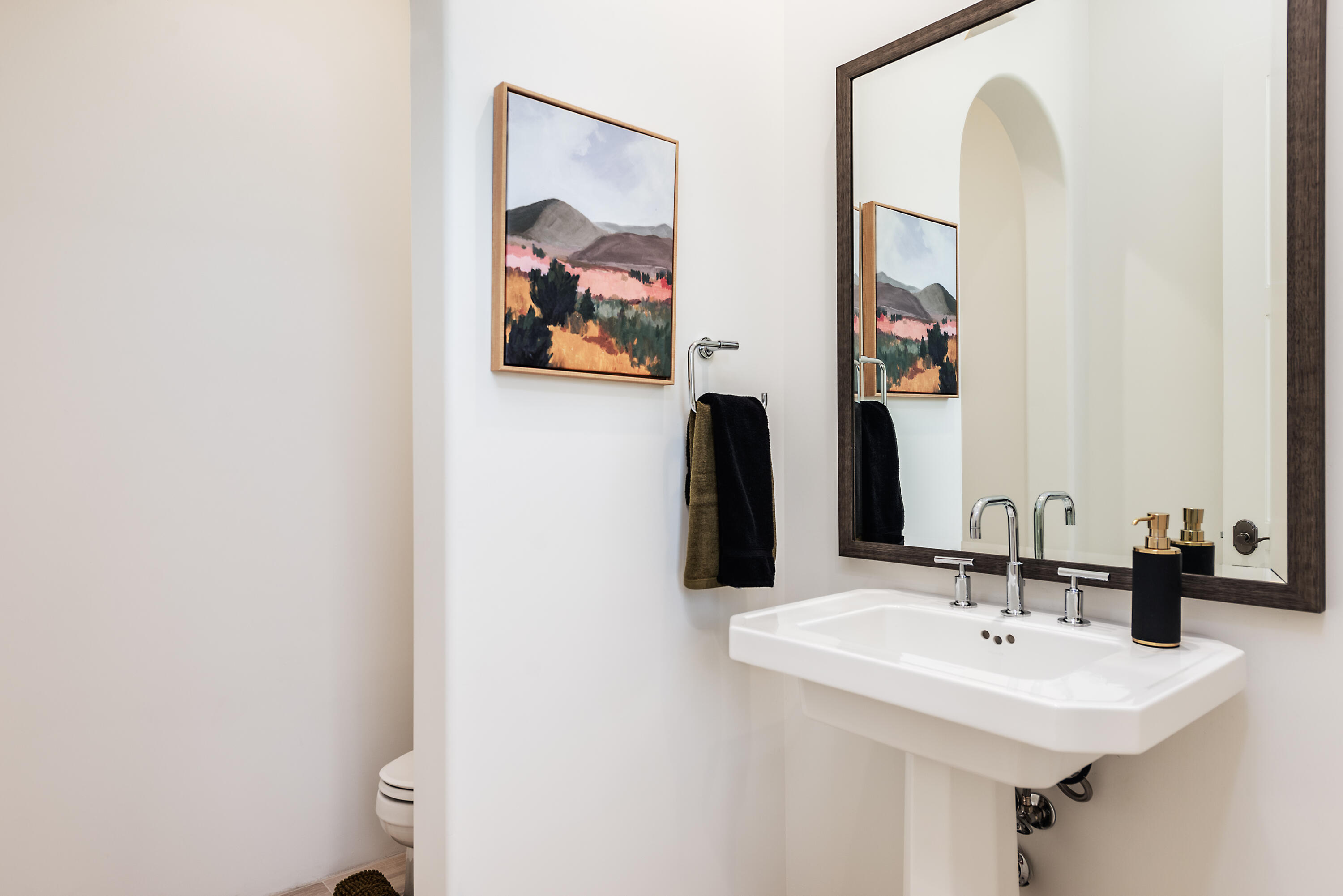 81660 Andalusia La Quinta, CA 92253 - Photo 25 of 36 a bathroom with a sink and a mirror