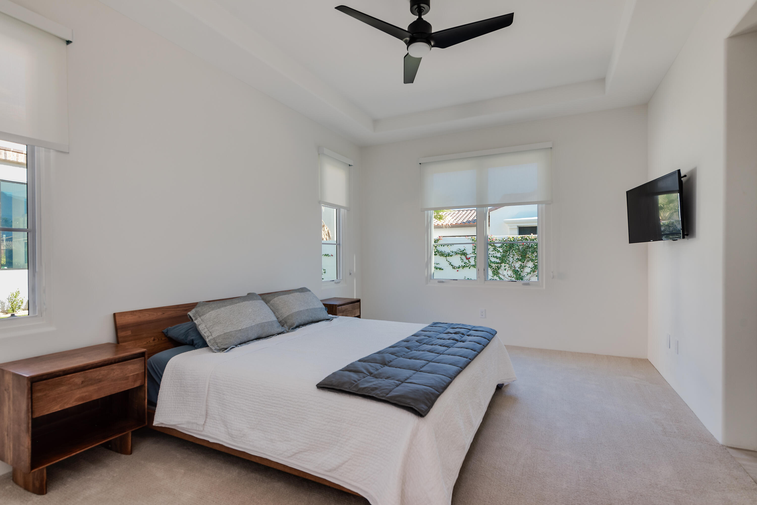 81660 Andalusia La Quinta, CA 92253 - Photo 29 of 36 a bedroom with a bed and a window