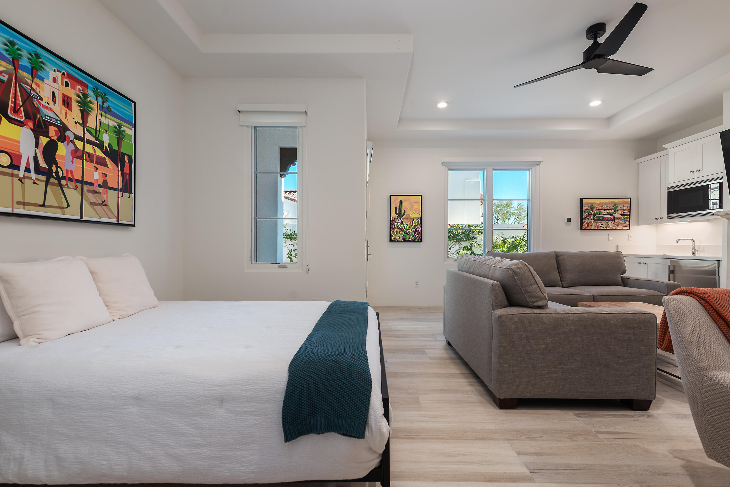 81660 Andalusia La Quinta, CA 92253 - Photo 33 of 36 a living room with furniture and a flat screen tv