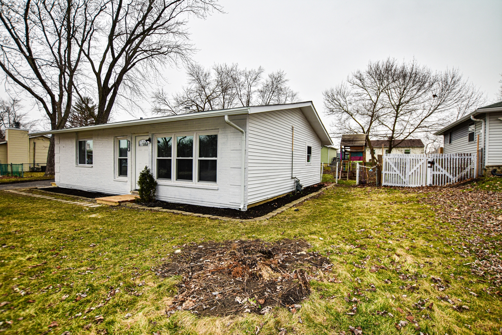 109 South Bartlett Road Streamwood, IL 60107 - Photo 2 of 39 a view of a house with a yard