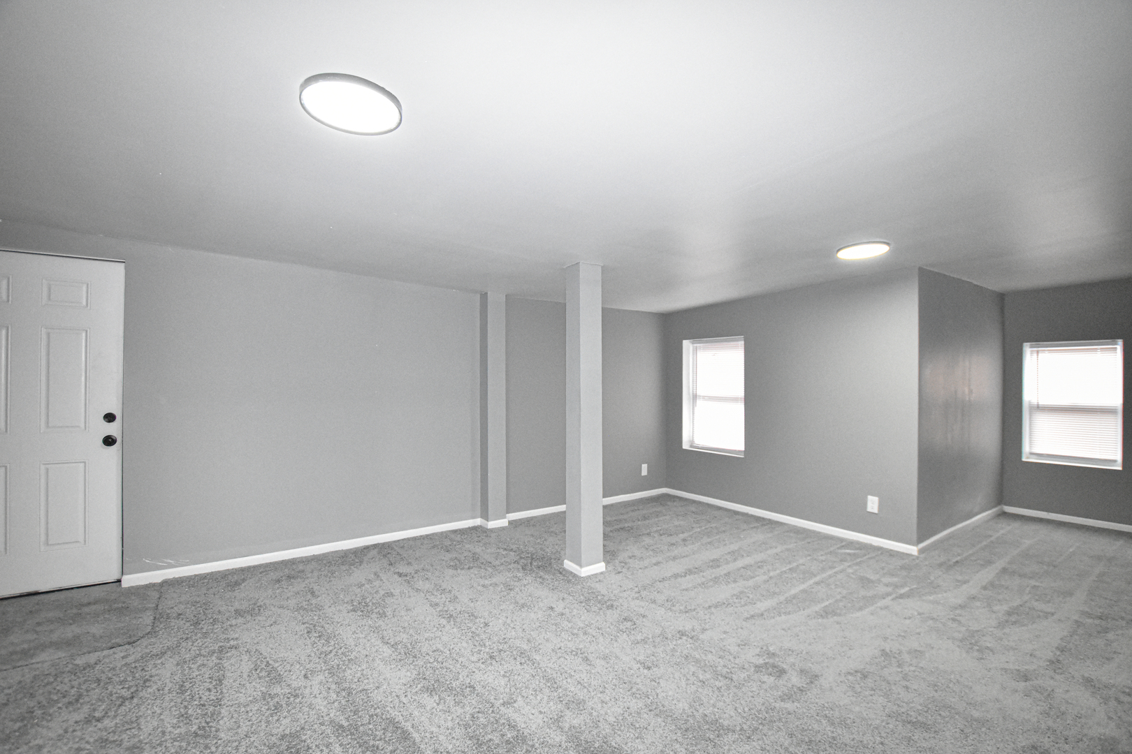 109 South Bartlett Road Streamwood, IL 60107 - Photo 29 of 39 wooden floor in an empty room with a window