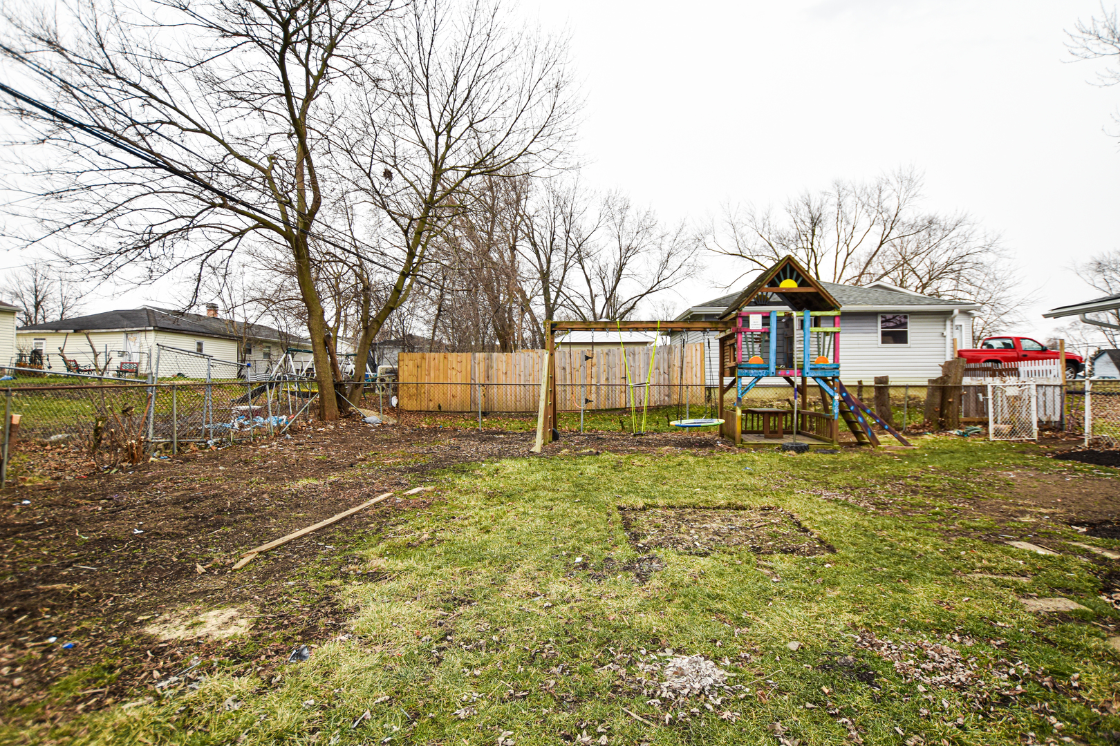 109 South Bartlett Road Streamwood, IL 60107 - Photo 37 of 39 a view of a yard with a house in the background