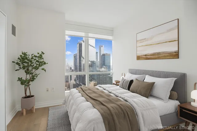 a bathroom with a sink double vanity and a mirror
