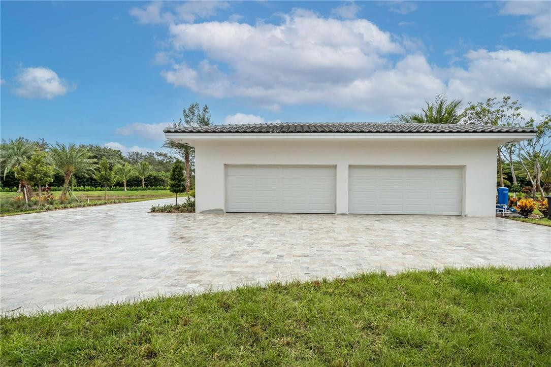 13731 Stirling Road Southwest Ranches, FL 33330 - Photo 13 of 55 a view of a backyard