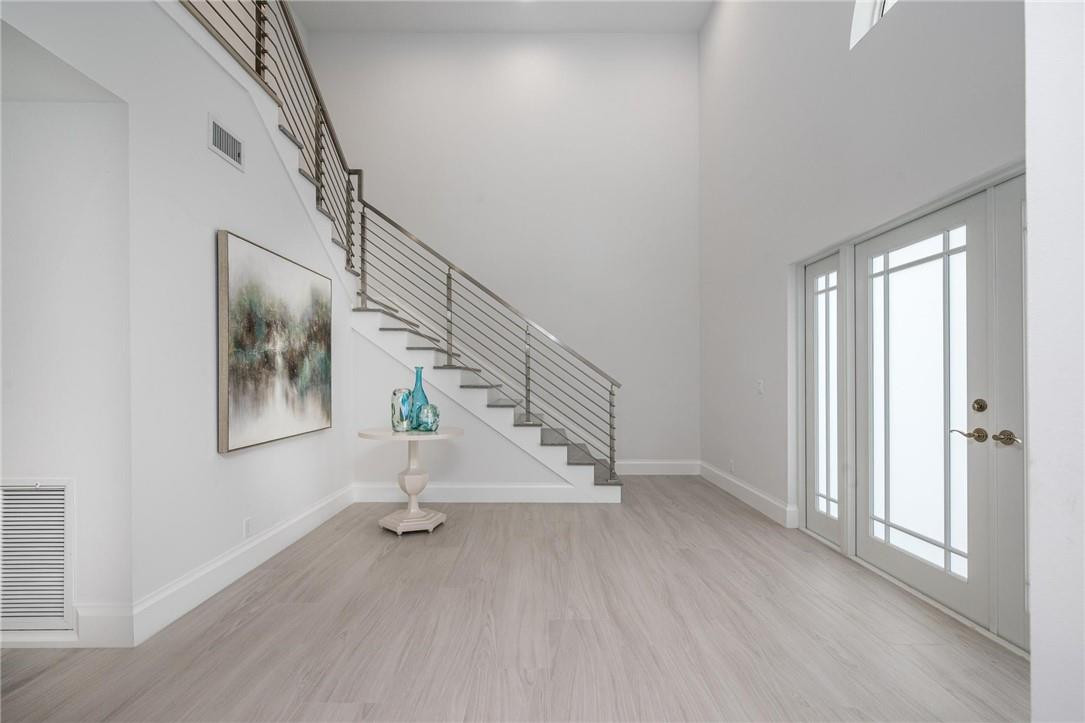13731 Stirling Road Southwest Ranches, FL 33330 - Photo 16 of 55 a view of entryway with stairs and wooden floor