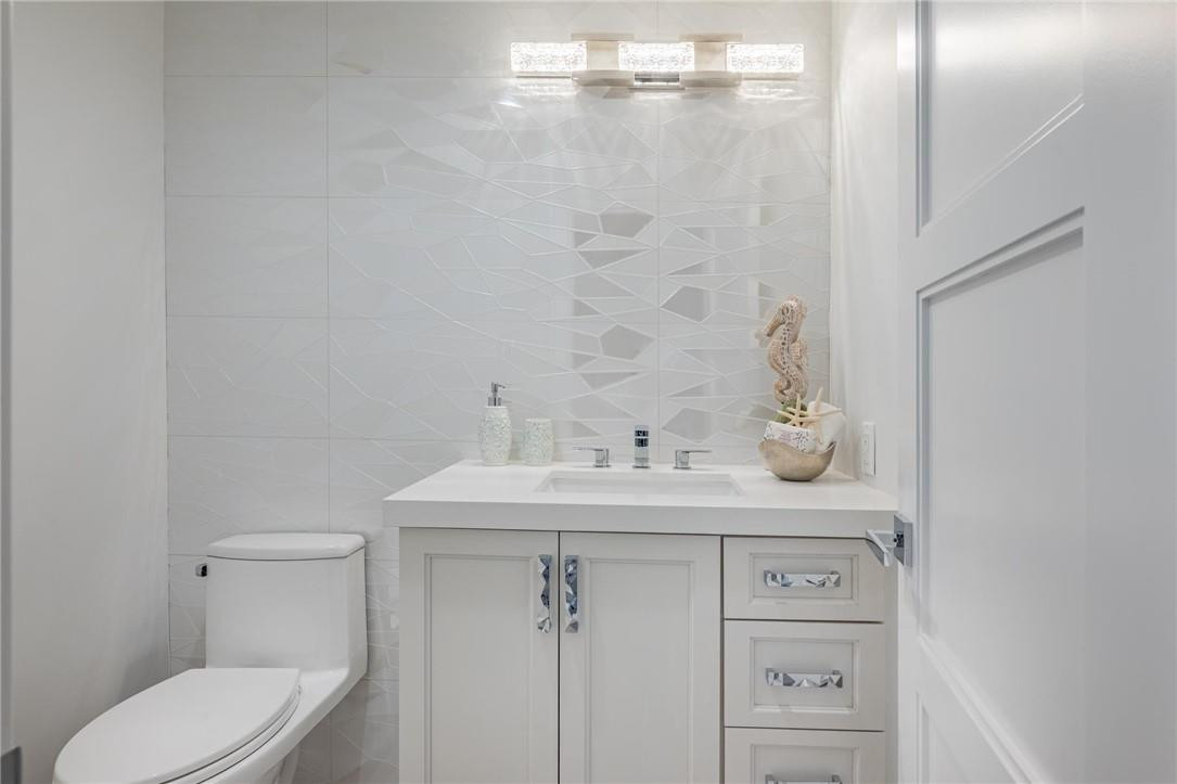 13731 Stirling Road Southwest Ranches, FL 33330 - Photo 22 of 55 a bathroom with a sink a toilet and shower