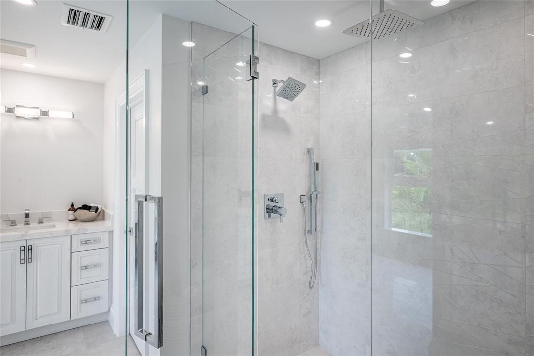 13731 Stirling Road Southwest Ranches, FL 33330 - Photo 50 of 55 a bathroom with a shower and a sink