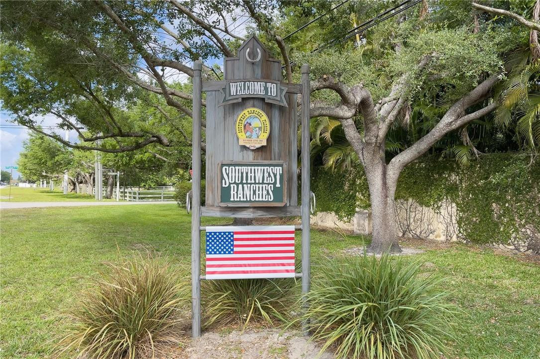 13731 Stirling Road Southwest Ranches, FL 33330 - Photo 55 of 55 a sign that is on the side of a road