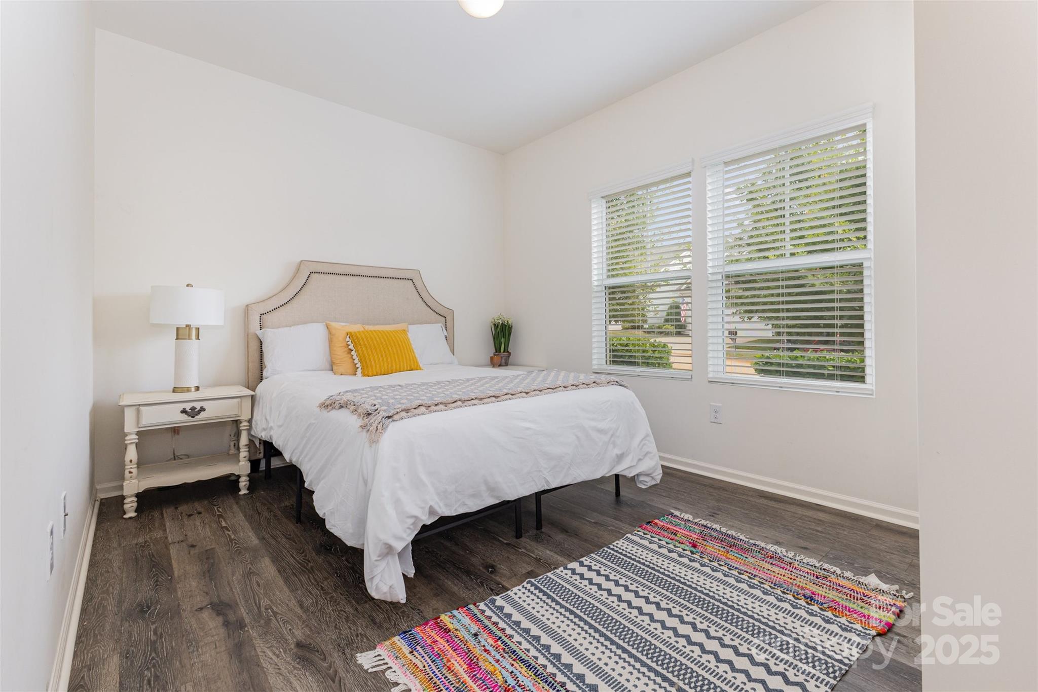 50113 Robins Nest Lane Lancaster, SC 29720 - Photo 14 of 20 a bedroom with a bed and wooden floor