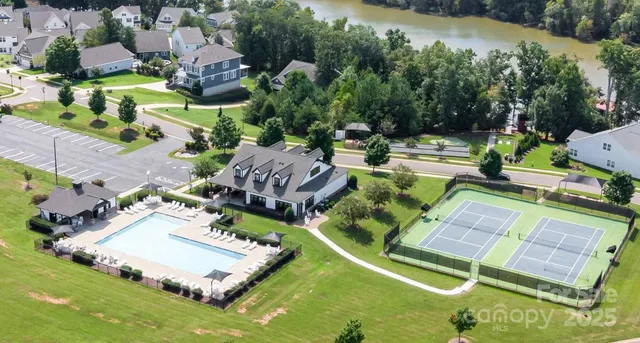 a view of a swimming pool with a patio