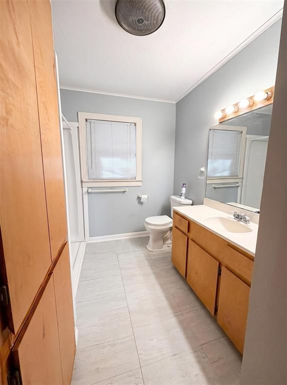 1925 Highway 527 Elm Grove, LA 71051 - Photo 15 of 15 a bathroom with a granite countertop sink toilet and a mirror