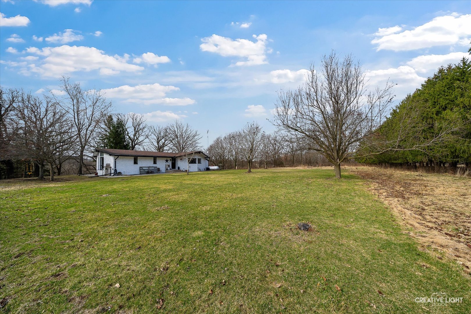 6815 West Dupont Road Morris, IL 60450 - Photo 1 of 34 a view of yard with swimming pool and green space