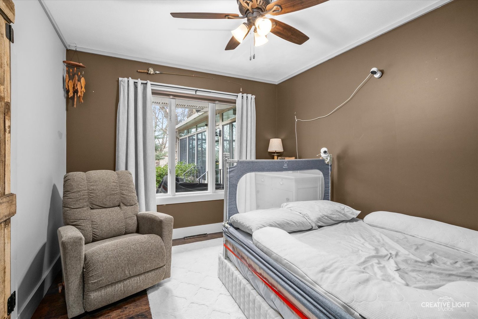 6815 West Dupont Road Morris, IL 60450 - Photo 17 of 34 a bedroom with a bed and a couch