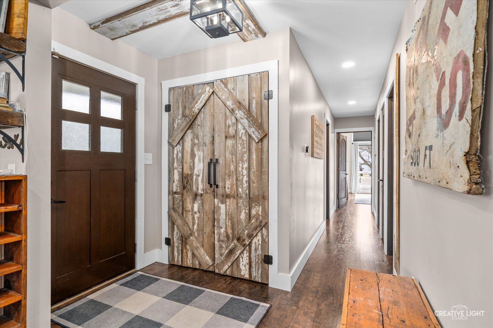6815 West Dupont Road Morris, IL 60450 - Photo 5 of 34 a view of entryway with wooden floor and stairs