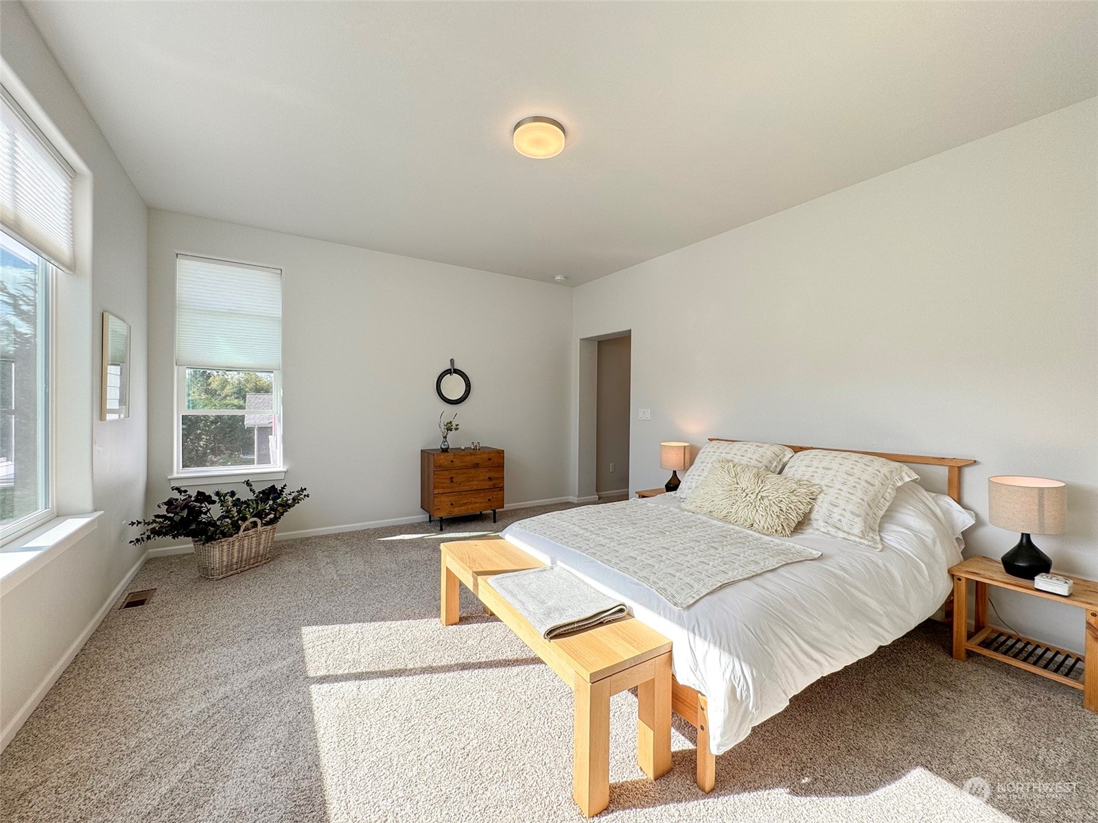461 Morgison Loop Sequim, WA 98382 - Photo 27 of 40 a bed room with a bed and a couch