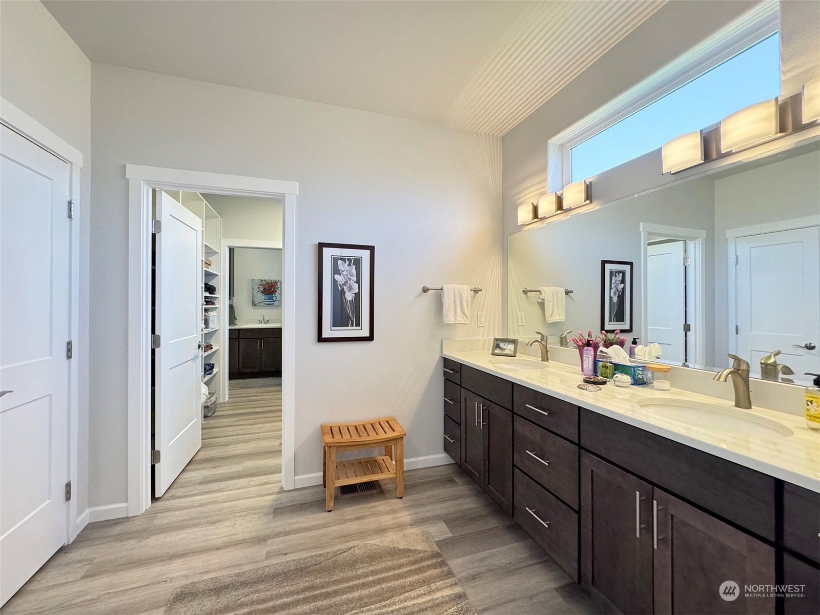 461 Morgison Loop Sequim, WA 98382 - Photo 31 of 40 a spacious bathroom with a double vanity sink a mirror and a shower