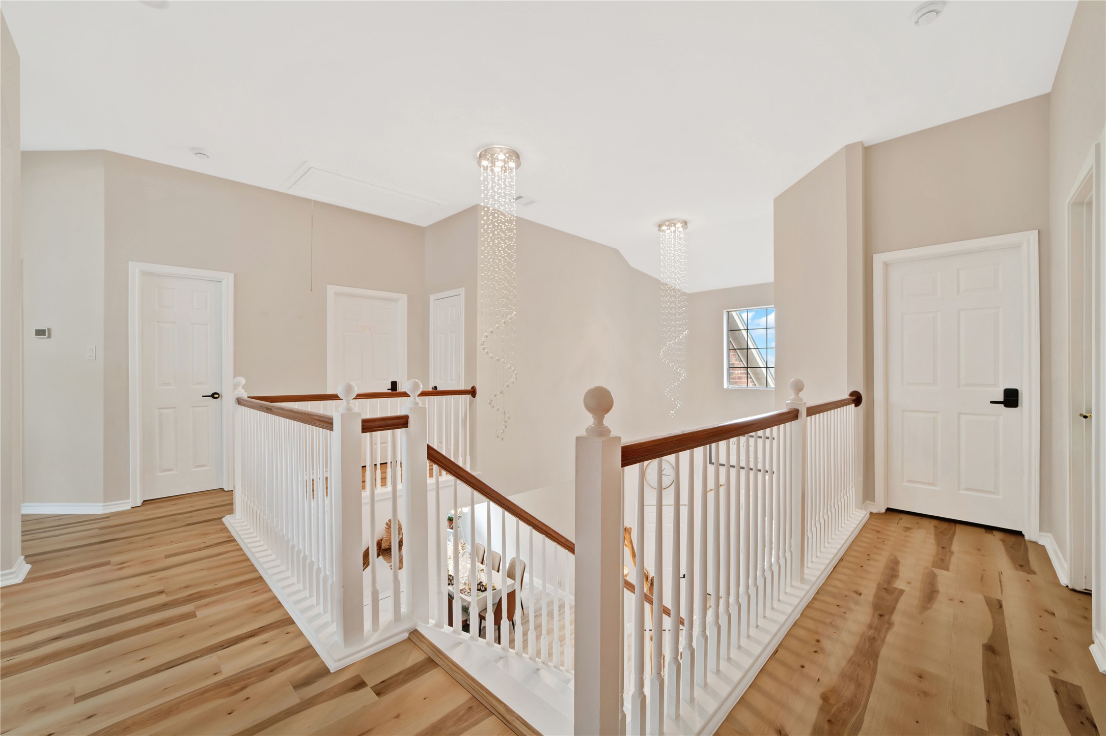3032 Prairie Bluff Seguin, TX 78155 - Photo 6 of 23 a view of a hallway with wooden floor and stairs