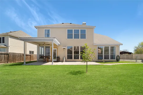 a porch with yard and outdoor seating