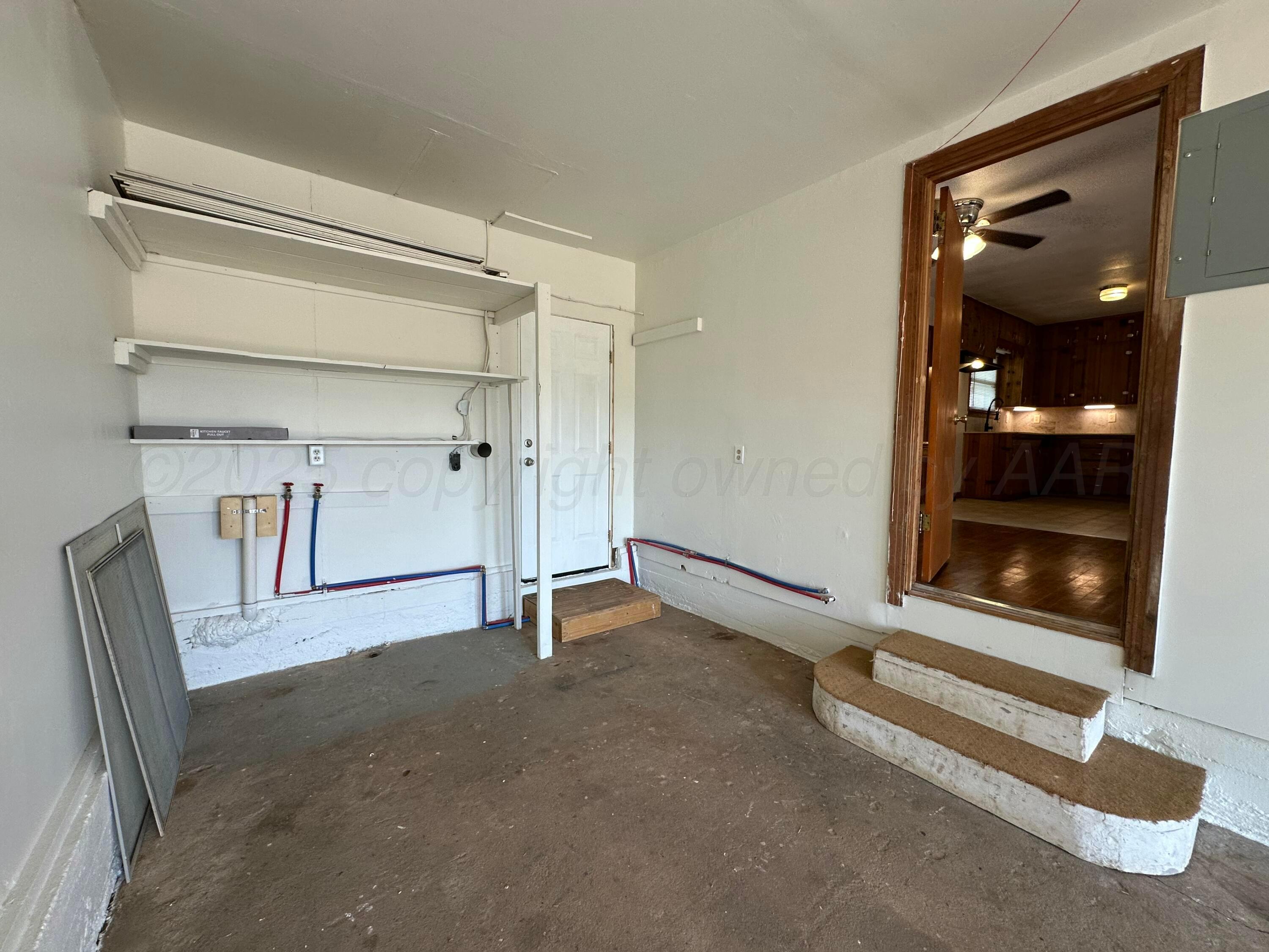 913 Bell Avenue Turkey, TX 79261 - Photo 17 of 18 a view of empty room with front door