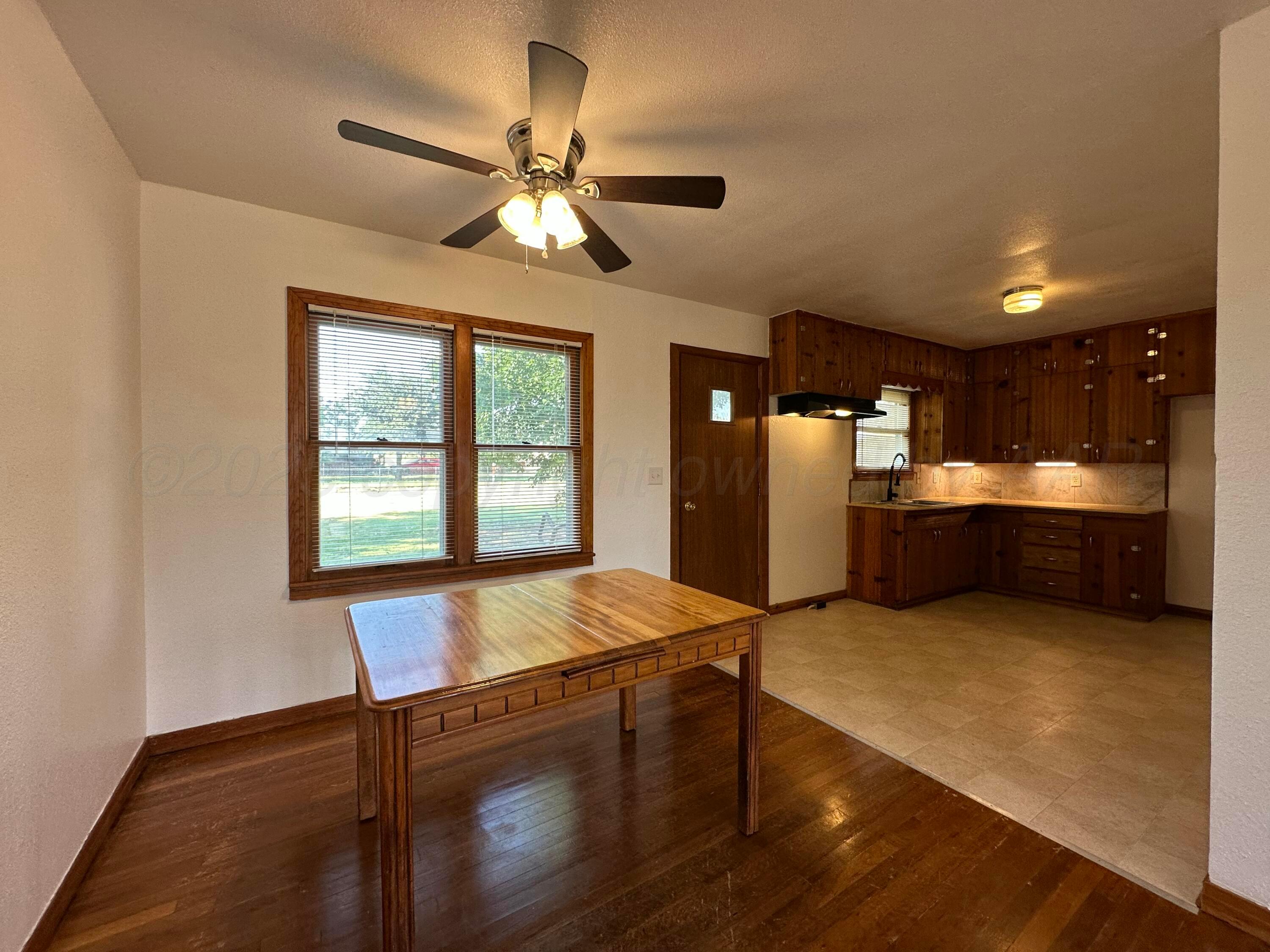 913 Bell Avenue Turkey, TX 79261 - Photo 18 of 18 a view of kitchen with refrigerator and window