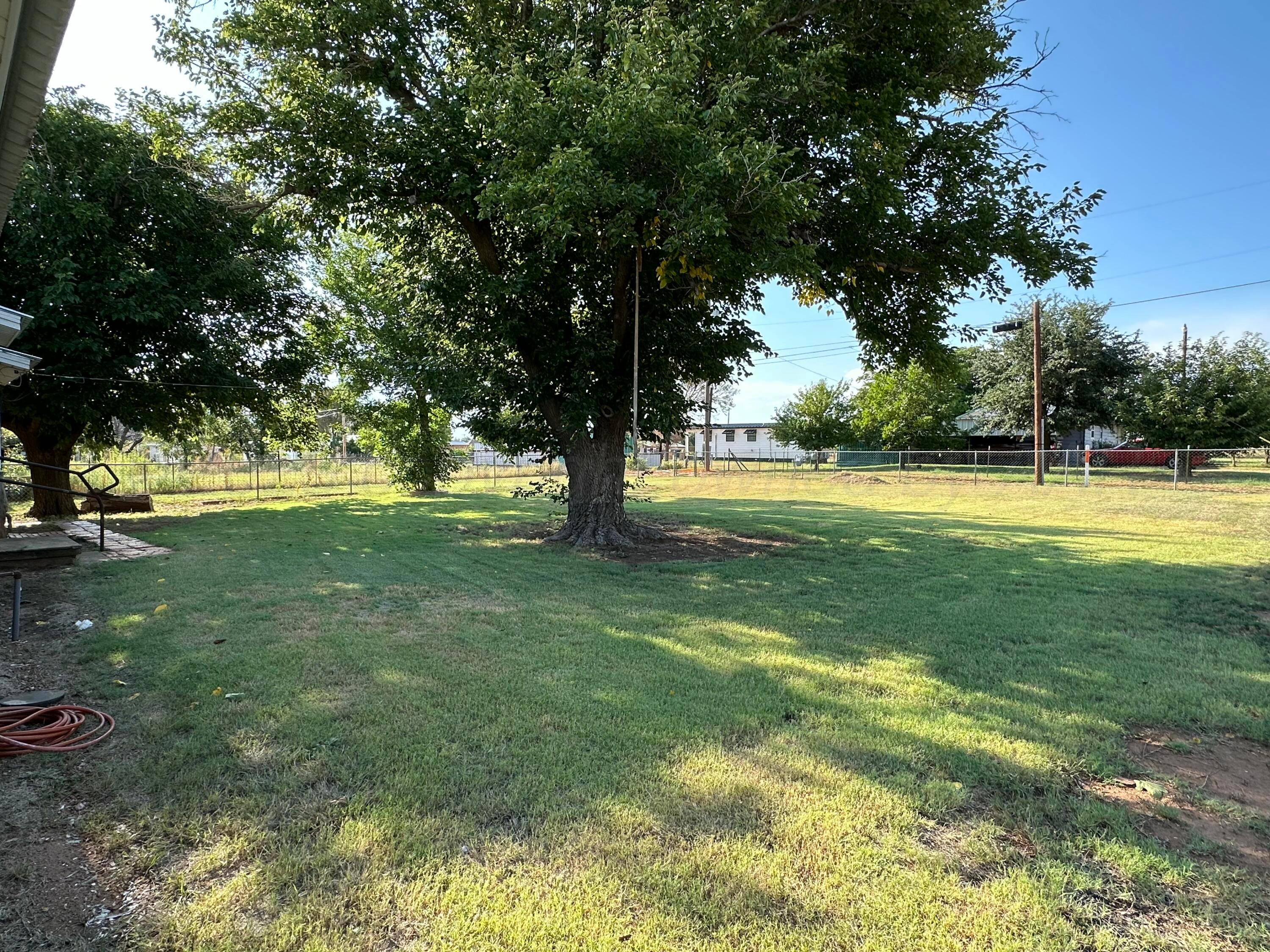 913 Bell Avenue Turkey, TX 79261 - Photo 3 of 18 a view of swimming pool with a yard